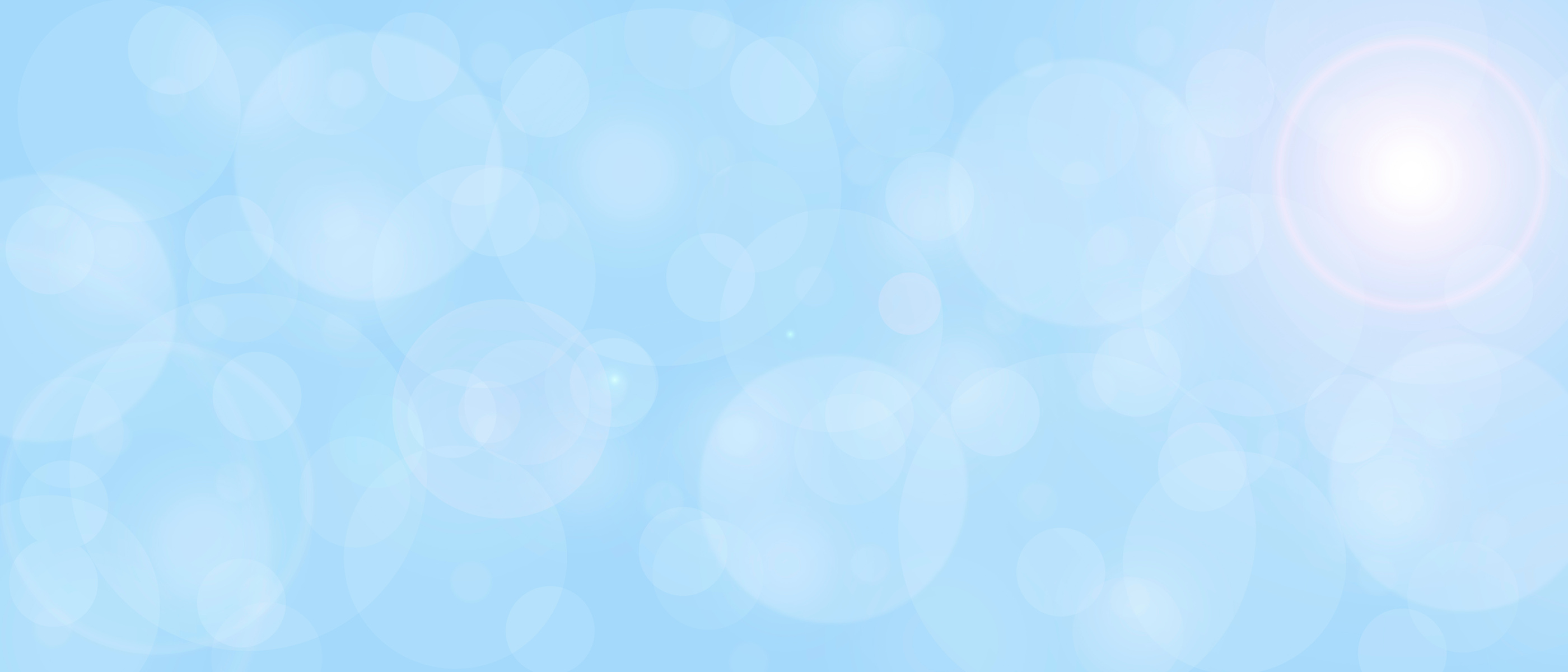 Light blue abstract background with blurry circles texture